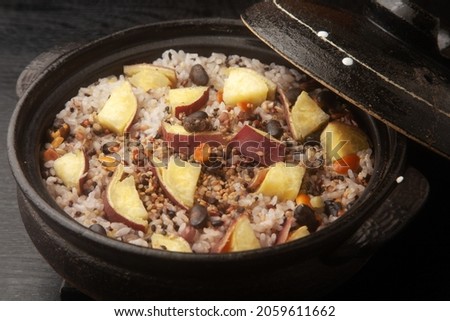 Rice cooked with sweet potatoes of miscellaneous grains Royalty-Free Stock Photo #2059611662
