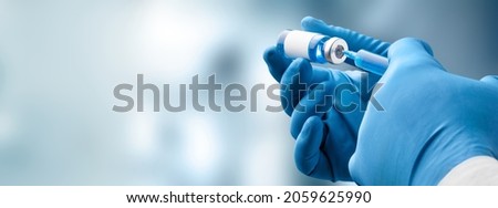 Focus on vaccine, doctor or nurse hands taking covid vaccination booster shot Royalty-Free Stock Photo #2059625990