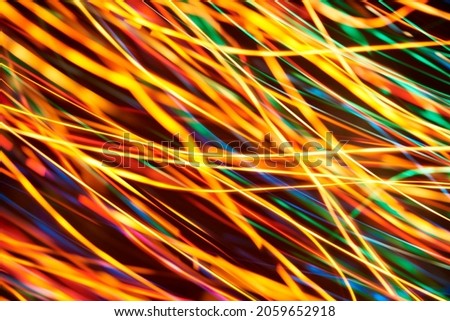 Abstract dynamic background, colorful oblique light lines. Concepts of motion, energy and vitality.