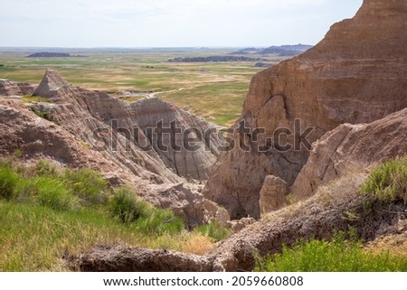 Norbeck Pass at Fossil Exhibit Trailhead in Badland national park during sunny summer. Badland landscape South Dakota. Royalty-Free Stock Photo #2059660808