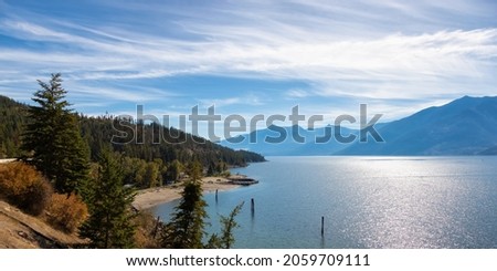 Scenic View of Kootenay Lake. Sunny Fall Season Day. Near Nelson, British Columbia, Canada. Royalty-Free Stock Photo #2059709111