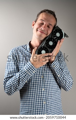 A man bought a graphic card at a sale.