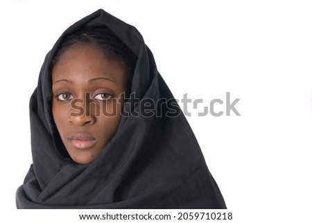 portrait of african american muslim woman with veil