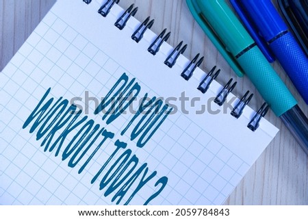 Conceptual caption Did You Workout Today. Business idea asking if made session physical exercise Multiple Assorted Collection Office Stationery Photo Placed Over Table