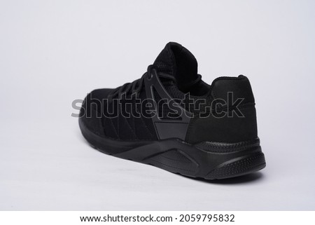 Shoe in front of a white background in the studio