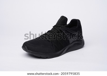 Shoe in front of a white background in the studio