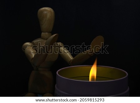 Woody the Puppet with fire