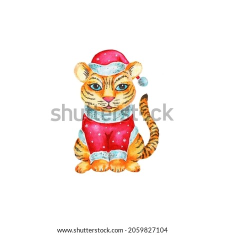 Cute tiger cub in red Santa costume isolated on white background, hand painted with watercolor. Tiger symbol of New Year 2022 illustration for your design