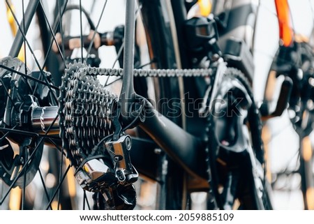 Close-up cropped photo of cassette and chain on professional road bike Royalty-Free Stock Photo #2059885109