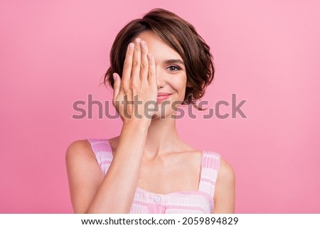 Photo of young attractive woman cover eye arm check-up vision ophthalmology isolated over pink color background
