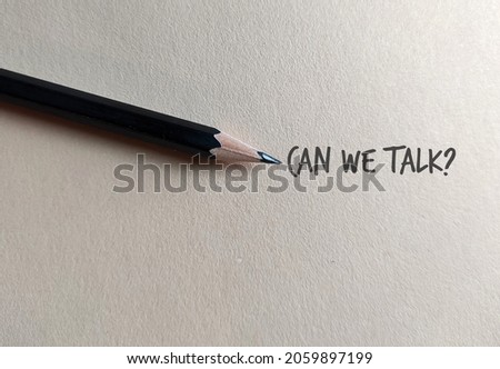 Pencil on copy space craft paper with text written CAN WE TALK?, concept of asking to have an openly communication which is important in relationships or better understandings when working in team Royalty-Free Stock Photo #2059897199