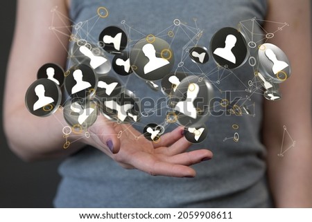 An abstract shot of a woman's hand presenting 3D rendered contact icons networking on the web
