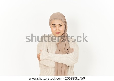 Looking at the camera and smile of Beautiful Asian Woman Wearing Hijab Isolated On White Background