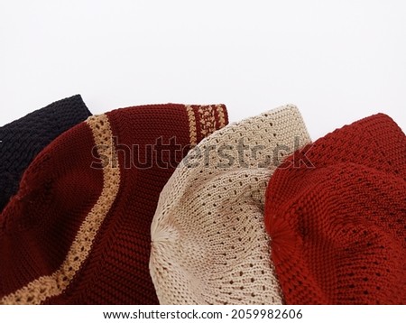 Some colorful skullcaps isolated on white background