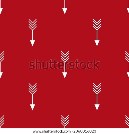 Bright geometric seamless pattern background with repetitive crossed arrows on red backdrop for Christmas theme designs.vector illustration 
