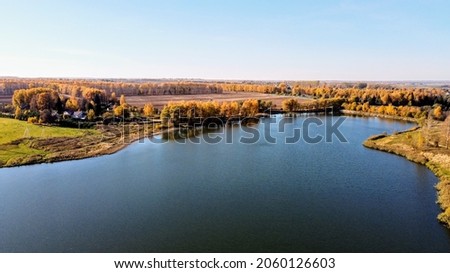 aerial photography lake golden autumn Royalty-Free Stock Photo #2060126603