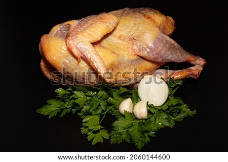 Guinea fowl meat with greens and spices. Organic delicious guinea fowl meat Royalty-Free Stock Photo #2060144600