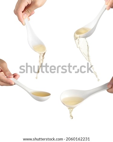 chef pouring noodle soup isolated on white background, Soup for sukiyaki from chicken and fish