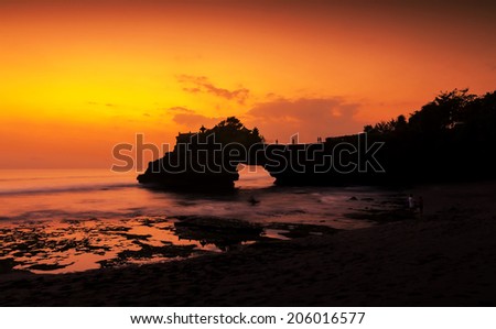 Tanah Lot temple in golden sunset, Bali , Indonesia Royalty-Free Stock Photo #206016577
