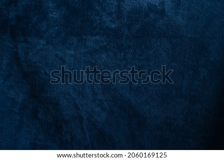 Beautiful grunge velvet dark navy blue background. Wide banner or wallpaper rough styled with space for text and design. Uneven velvety photography backdrop Royalty-Free Stock Photo #2060169125