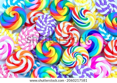Seamless pattern with candy. Colorful lollipops, candy background. Many sweet candies close-up Royalty-Free Stock Photo #2060217581