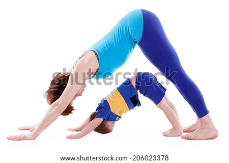 mother and son doing yoga. isolated on white 