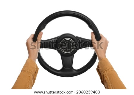Woman with steering wheel on white background, closeup Royalty-Free Stock Photo #2060239403