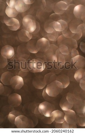 Gold abstract glitter background with shiny bokeh