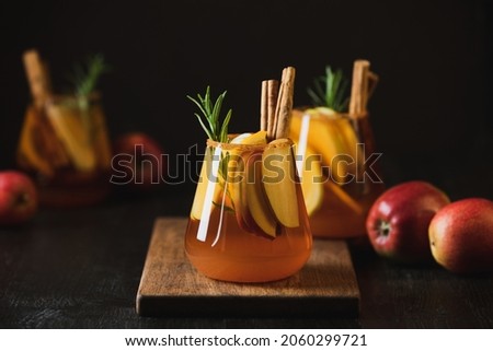 Apple cider old fashioned alcohol cocktail front view Royalty-Free Stock Photo #2060299721