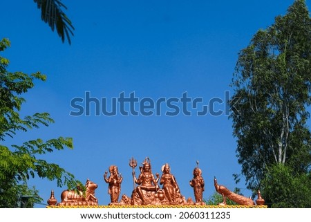 Indian God Shiva Family statue with sky