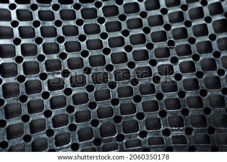 Texture: black metal iron grating, grid or stainless steel grate. Venting, ventilation with geometric design pattern