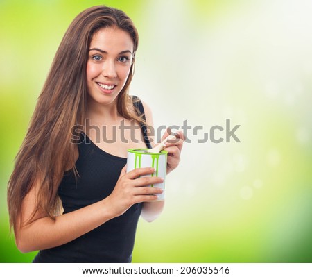 portrait of a girl holding a paint can
