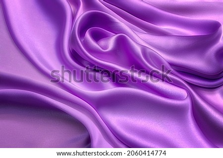 Fabric texture, background for design. Texture of puple silk or cotton or wool fabric. Beautiful pattern of waven fabric.