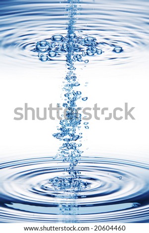 Bubbles forming in blue water, isolated