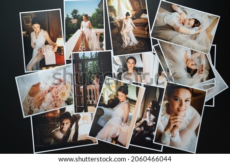 spread out a printed copy of the wedding photos. the result of the photographer's work at the wedding. printed products. a photo session of the bride and groom.