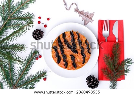 Christmas food. Tiger salad in the symbol of the year. New year 2022