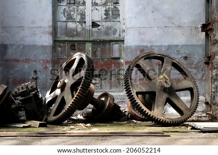 rusty old metal gadgets in an abandoned ship factory Royalty-Free Stock Photo #206052214