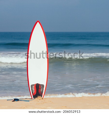 Surfboard in the Sand Royalty-Free Stock Photo #206052913