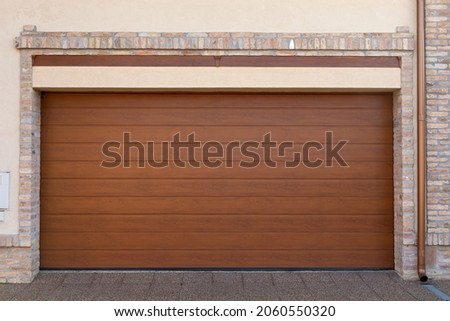 Picture of automatic brown metal roller door