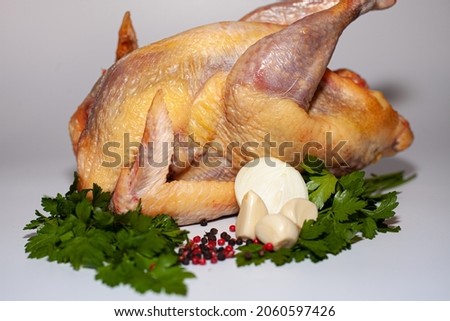 Guinea fowl meat with greens and spices. Organic delicious guinea fowl meat Royalty-Free Stock Photo #2060597426