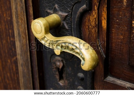 Old antique golden door handle