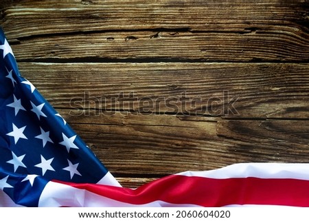 Veterans day. Honoring all who served. American flag on wooden background