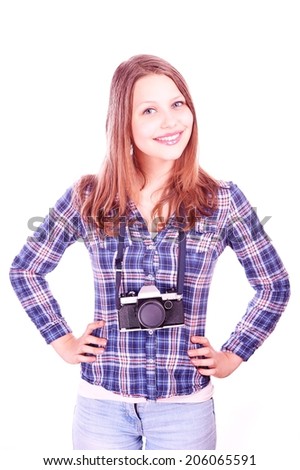 Portrait of a happy smiling teen girl standing with camera