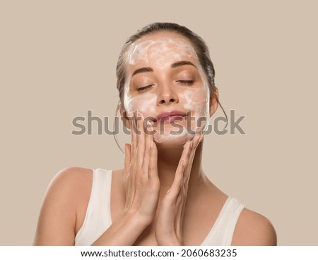 Soap face woman clean skin beauty. Color background. Brown Royalty-Free Stock Photo #2060683235