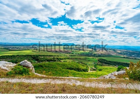 Green valleys from a high mountain. Beautiful natural landscape in summer