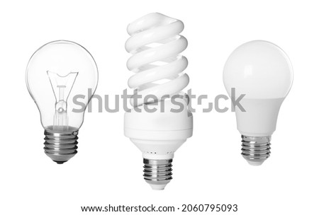 Comparison of different light bulbs on white background, collage Royalty-Free Stock Photo #2060795093