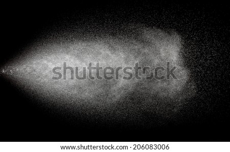 Spraying of water in motion isolate on black background. Royalty-Free Stock Photo #206083006