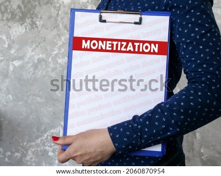 Business concept about MONETIZATION with sign on the sheet. 
