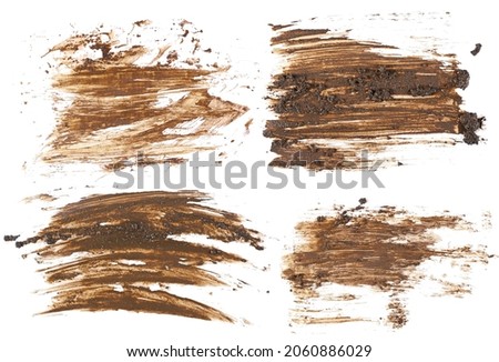 set drops of mud sprayed isolated on white background, with clipping path Royalty-Free Stock Photo #2060886029