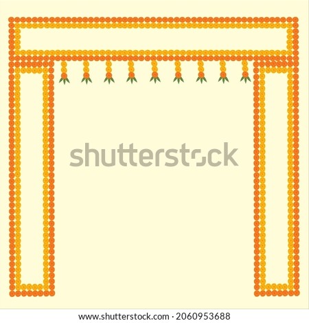 Toran Indian door decoration with marigold flowers in yellow and orange color and mango leaves on off white color background